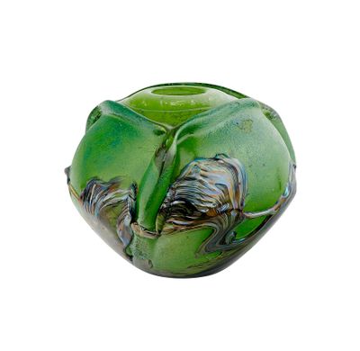 a green vase with a bird on it on a white background