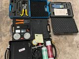 many different tools in the case on the floor