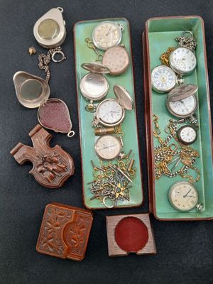 many different types of watches on display on the table