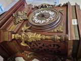 a wooden table with a clock on top of it