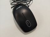 a computer mouse that is connected to a charger