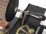a small machine that has a coin in it