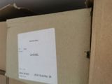 a box with a label on it sitting on a shelf