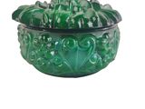 an image of a green glass bowl on a white background