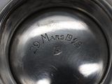 a close up of a silver cup with the word 20 marsion written on it