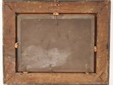 an old wooden picture frame with a small mirror in the middle