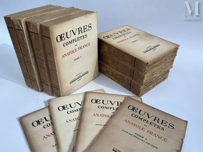 six old books are stacked on top of each other on a table