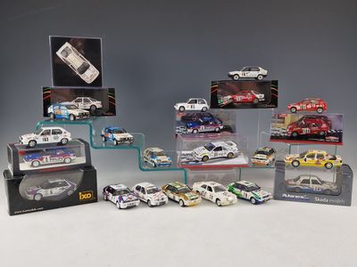 a lot of different models of cars in a display case