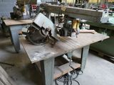 a machine that is sitting on a table in a workshop