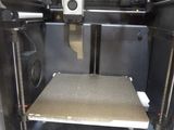 an image of a 3d printer with a tray in it