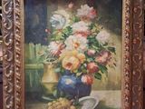 une peinture de fleurs dans un vase sur une table