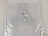 a plastic bag with a barcode on it sitting on a table