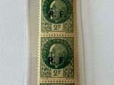 a close up of a piece of paper with stamps on it