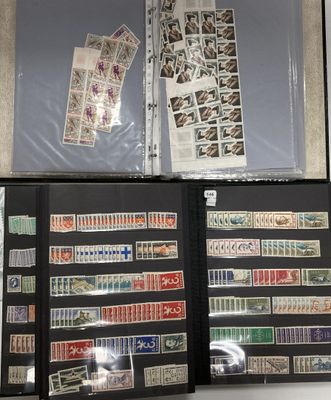 several different types of stamps are on display in a display case