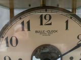 a close up of a clock with numbers on it