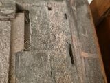 a close up view of a piece of wood with a hole in it