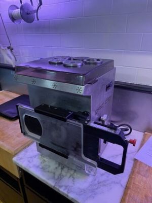 a microwave that is sitting on a counter in a kitchen