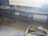 une image représentant un établi sur lequel se trouvent des outils