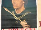 a poster of a man holding a feather on a pole