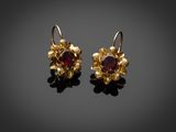 une paire de boucles d'oreilles en or et rubis