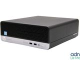 the hp desktop computer is sitting on a white surface