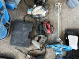 a lot of tools that are sitting on the floor