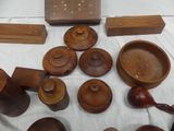 a table with a lot of wooden objects on it