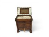a small wooden chest with a mirror on top