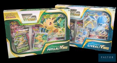 two boxes of pokemon cards are shown on a black background