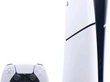 une console de jeux vidéo blanche et noire à côté d'une manette