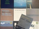 a lot of music books on the floor together