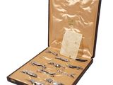 a case with a bunch of silverware in it