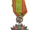 l'image d'une médaille portant une étoile