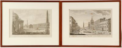 two framed pictures of a city street with a clock tower
