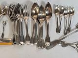 a lot of spoons and spoon spoons on the table