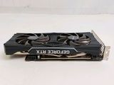 a close up of a video card on a white surface