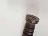 an image of a screw on a white wall