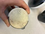 a person that is holding a blender in their hand