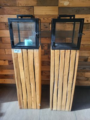 two wooden boxes with glass on them on the floor