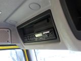 a radio in the center of a car ' s dash panel
