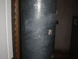 a water heater in the basement of a house