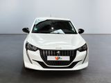 the front view of a white car parked in a room