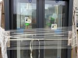 a window that has been wrapped up with a rope