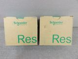 a pair of boxes with the words ress on them