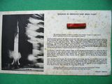 une vieille carte postale sur laquelle figure une photo du lancement d'une fusée