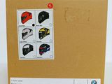 a cardboard box with a picture of a helmet on it