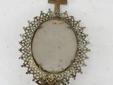 a picture of a mirror with a cross on it