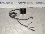 a picture of an electrical device with wires attached to it