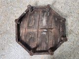 an overhead view of an old wooden door on a tiled floor