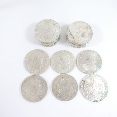 six different types of silver coins on a white surface